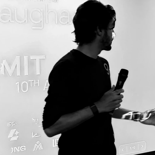 Black and white portrait while speaking at an event