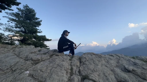 Looking out from a rocky mountain viewpoint