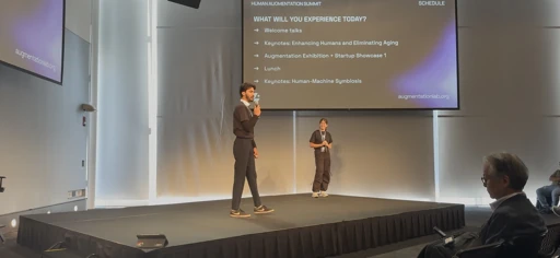 Presenting on a stage with a colleague