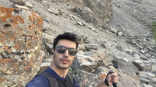 Portrait on a rocky hiking trail