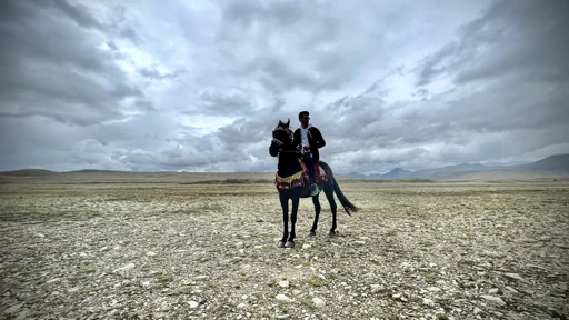 Friends together on an open plateau