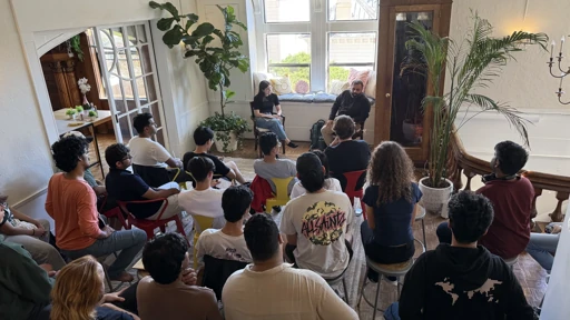 A community conversation in a bright room
