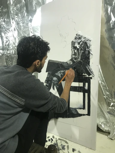 Painting at an easel