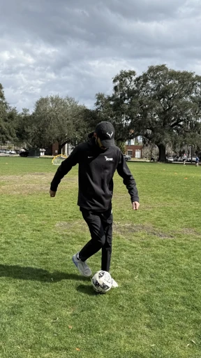 Playing football on a lawn