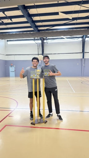Friends on an indoor badminton court