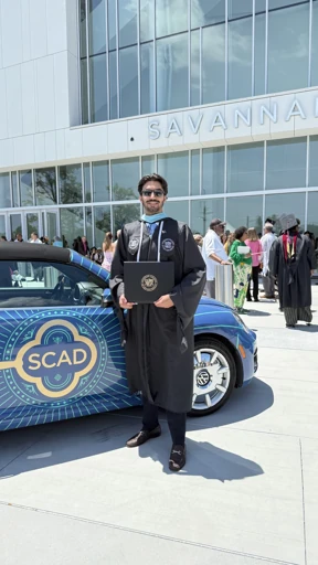 Graduation portrait outside a university building