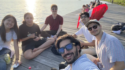 Friends beside the water on a sunny day