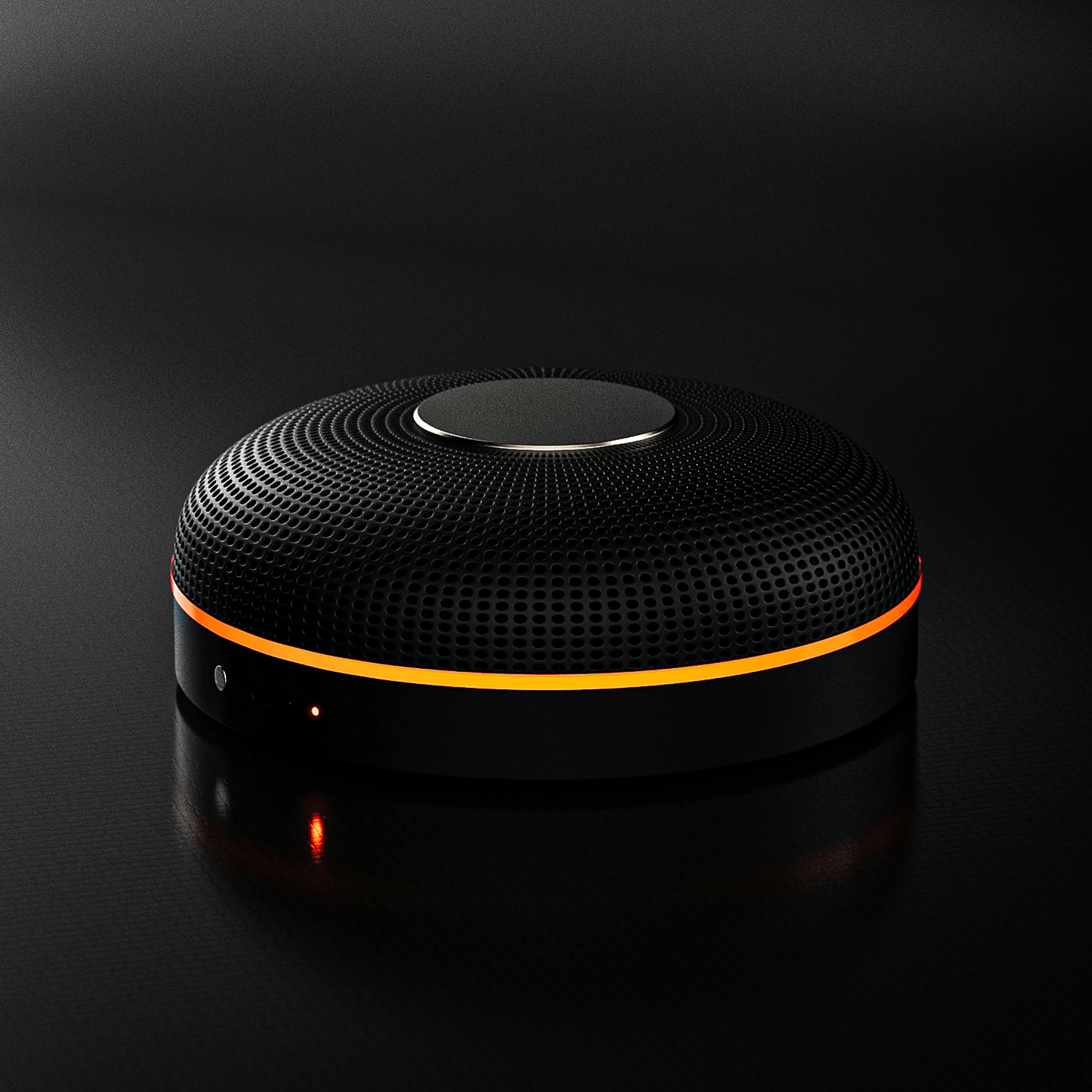 Spectre I audio privacy device with a perforated enclosure and orange light ring
